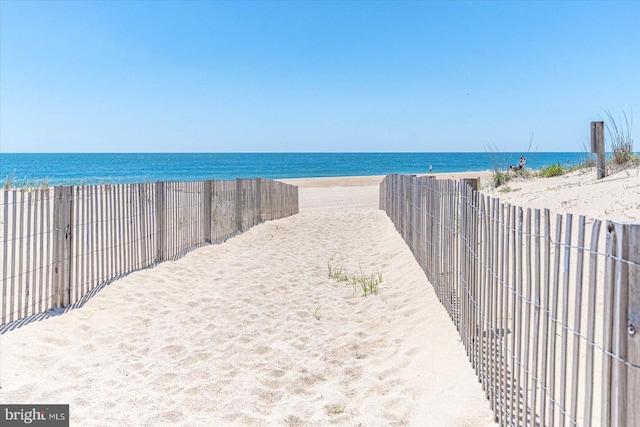 property view of water with a beach view