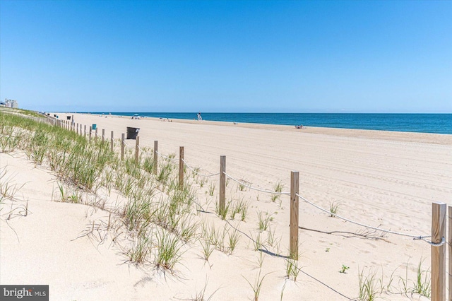 property view of water with a beach view