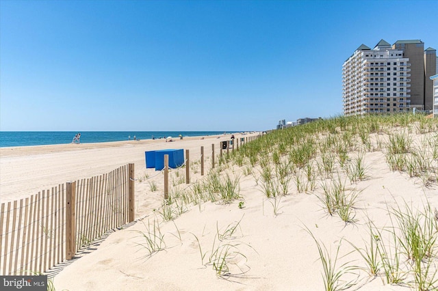 water view featuring a beach view