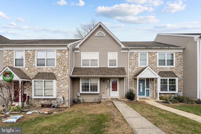 view of property with a front lawn