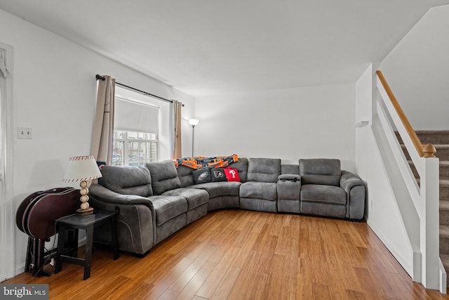 living room with light hardwood / wood-style floors