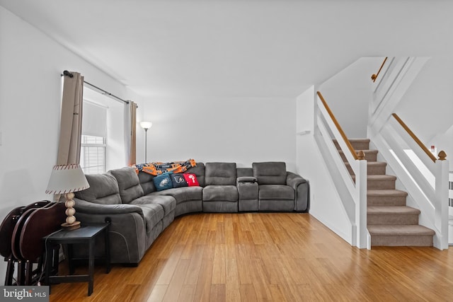 living room with light hardwood / wood-style flooring