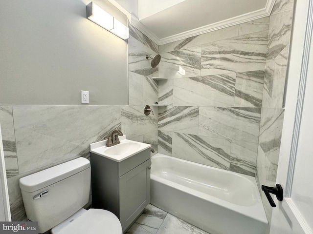 full bathroom with vanity, bathing tub / shower combination, crown molding, tile walls, and toilet