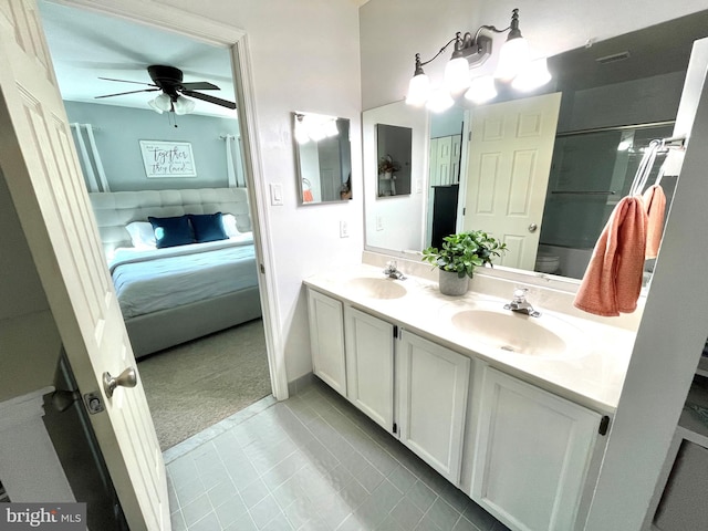 bathroom featuring tile patterned floors, ceiling fan, vanity, and toilet