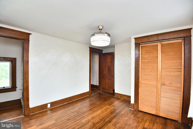 115 S Summit Ave, Woodstock, VA 22664 - unfurnished bedroom with hardwood / wood-style flooring and a closet