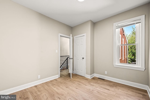 unfurnished bedroom featuring light hardwood / wood-style floors