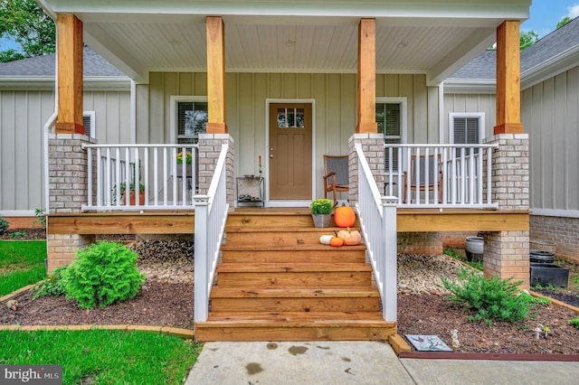 property entrance with a porch