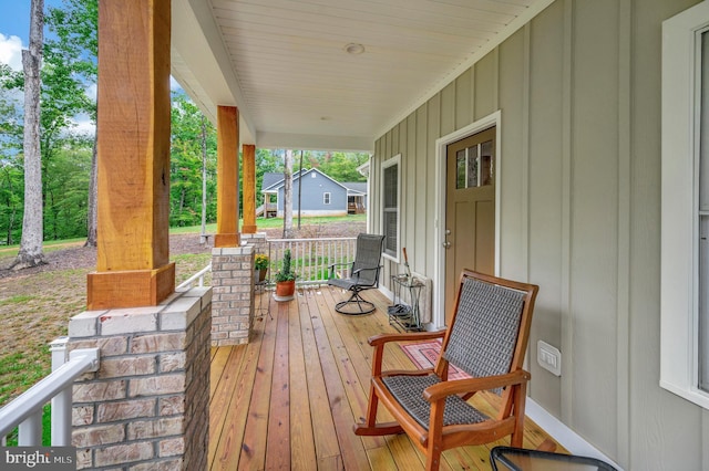 wooden deck with a porch