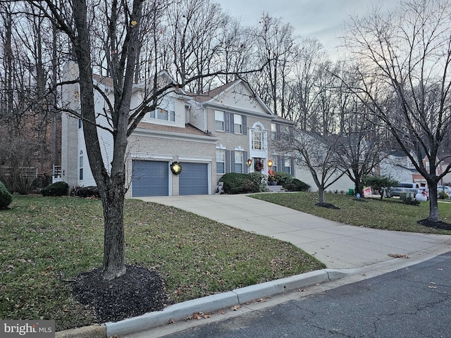 12817 Glasgow Ct, Fort Washington, MD 20744 - view of front of house with concrete driveway, a front lawn, and an attached garage