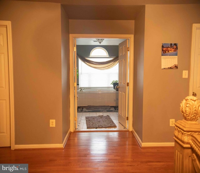 12817 Glasgow Ct, Fort Washington, MD 20744 - hallway with wood finished floors and baseboards