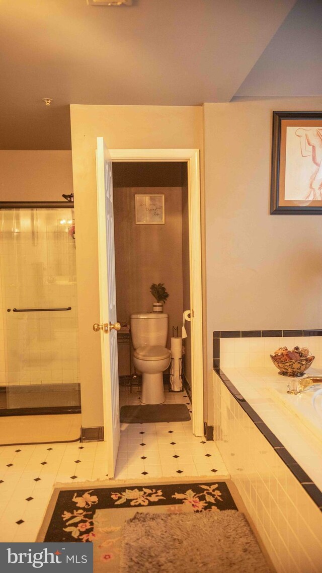 12817 Glasgow Ct, Fort Washington, MD 20744 - bathroom featuring toilet and tile patterned floors