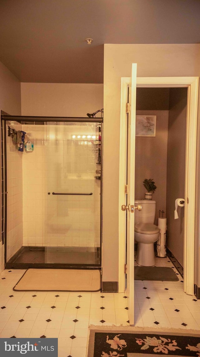 12817 Glasgow Ct, Fort Washington, MD 20744 - bathroom with a shower stall and tile patterned floors
