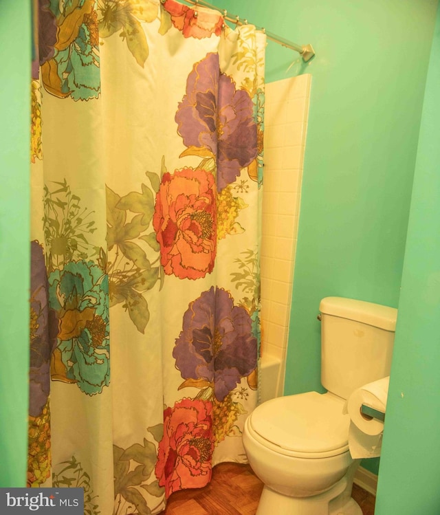 12817 Glasgow Ct, Fort Washington, MD 20744 - full bath featuring wood finished floors and shower / bath combination with curtain