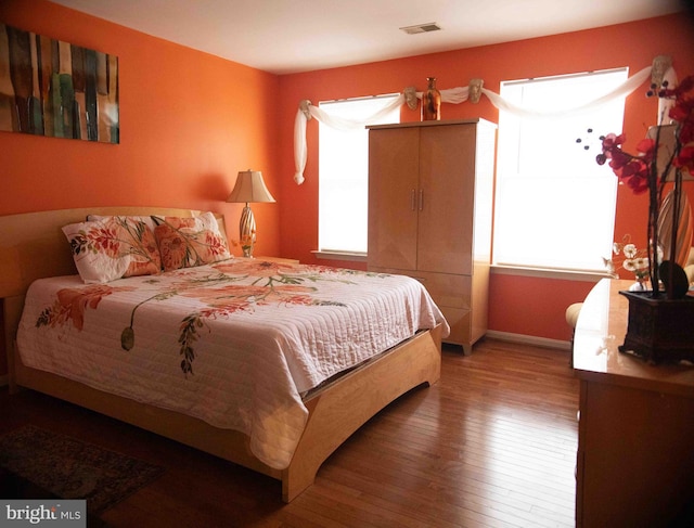 12817 Glasgow Ct, Fort Washington, MD 20744 - bedroom with hardwood / wood-style floors and baseboards