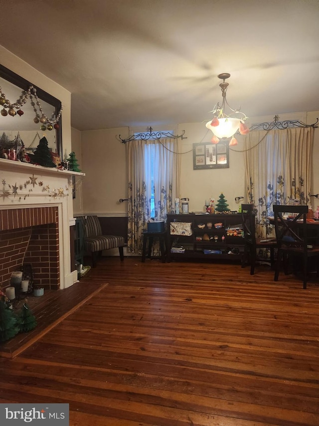 228 W Main St, Sharpsburg, MD 21782 - dining area with wood-type flooring and a brick fireplace