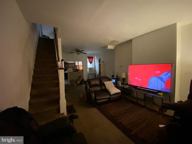 living room featuring ceiling fan