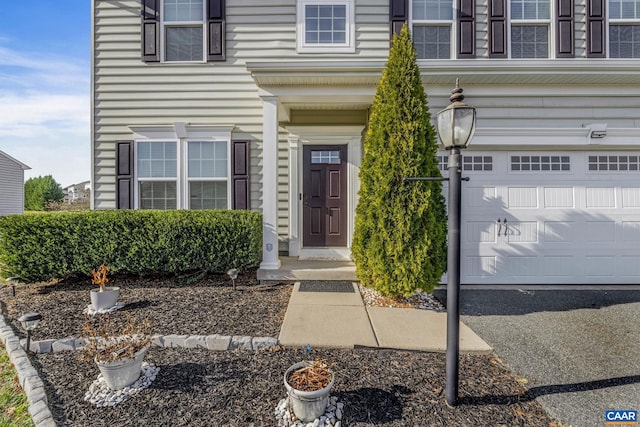 property entrance with a garage