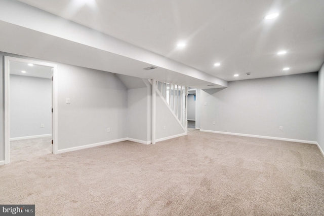 basement featuring carpet