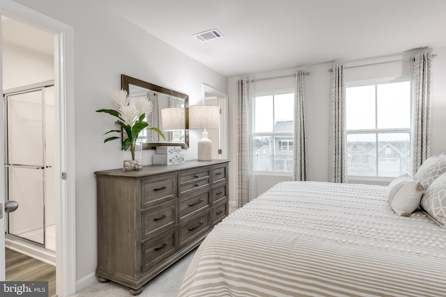 bedroom with light hardwood / wood-style flooring