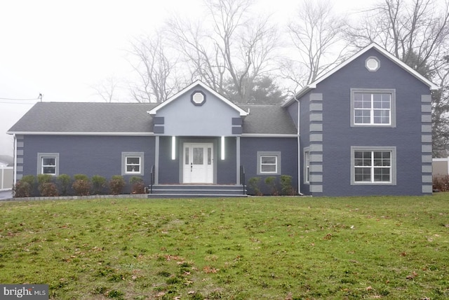 front facade with a front lawn