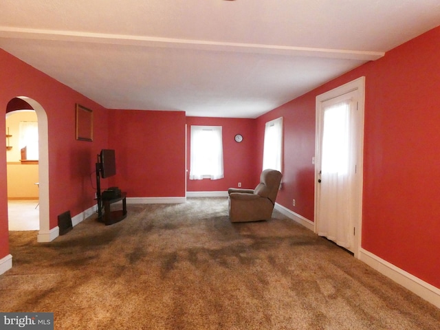 unfurnished room featuring carpet