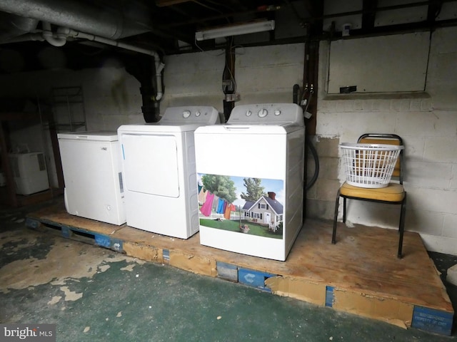 washroom featuring separate washer and dryer