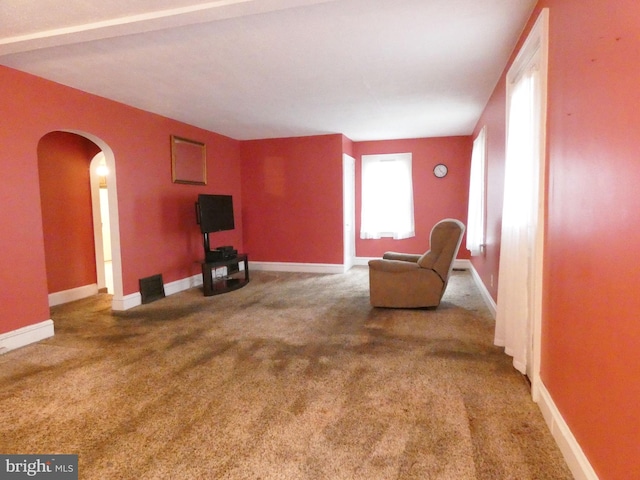 unfurnished room featuring carpet