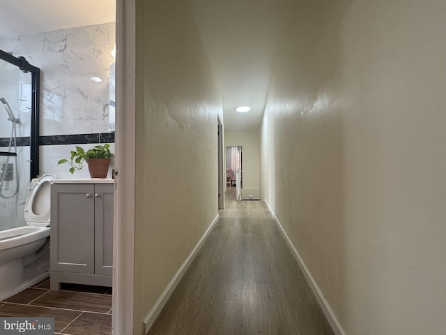 hall featuring dark wood-type flooring