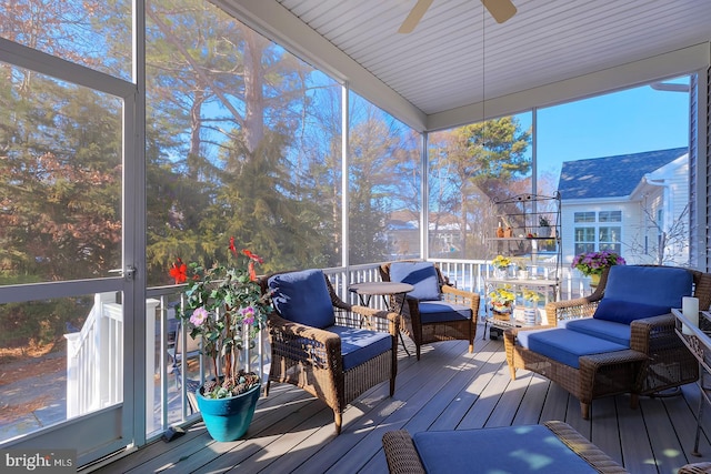 sunroom / solarium with ceiling fan