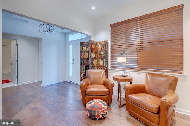 sitting room with hardwood / wood-style floors