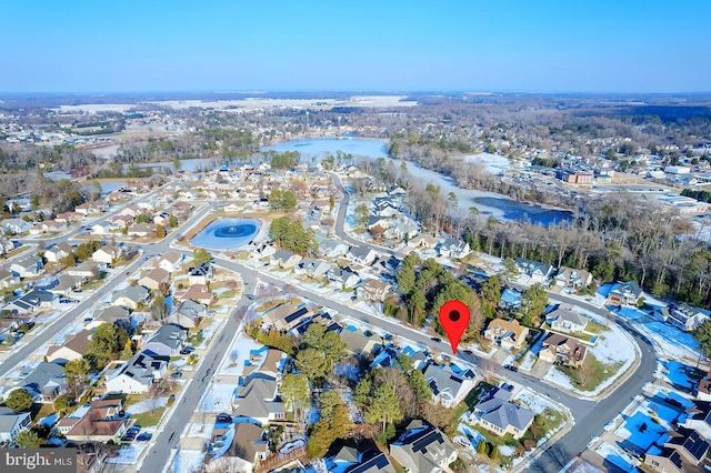 birds eye view of property featuring a water view