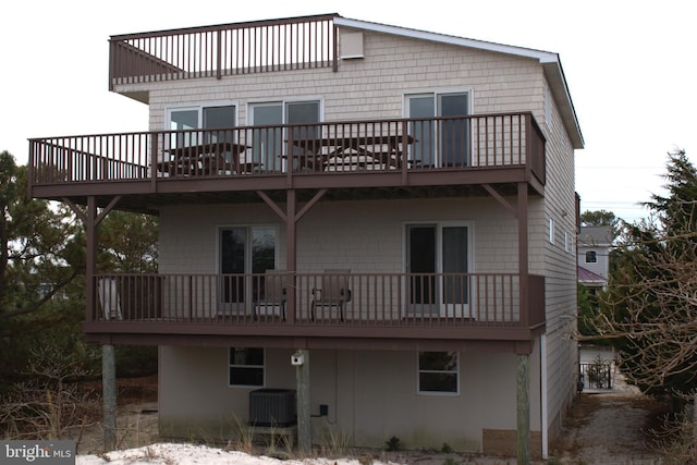 rear view of house with central air condition unit