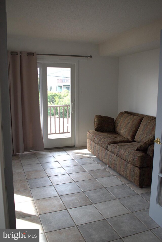 living room featuring light tile patterned flooring