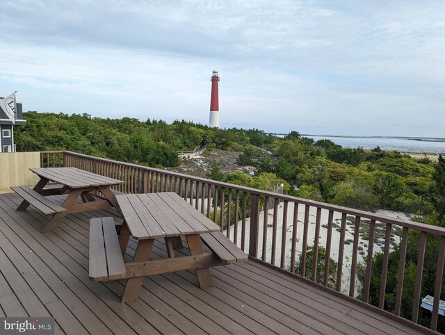 deck featuring a water view