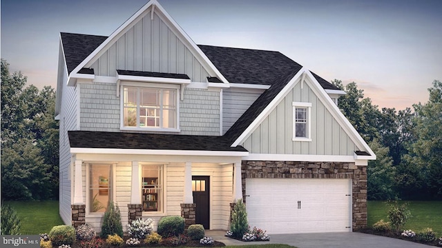 craftsman house with covered porch, board and batten siding, driveway, and a shingled roof