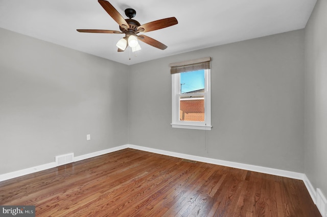 unfurnished room featuring wood-type flooring and ceiling fan