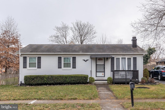 view of front of home with a front yard