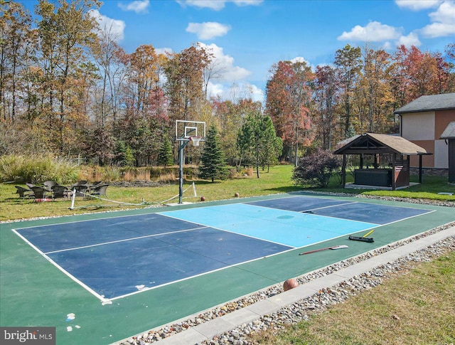 view of basketball court featuring a gazebo and a yard