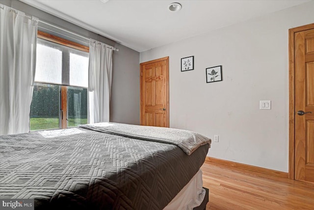 bedroom featuring hardwood / wood-style flooring