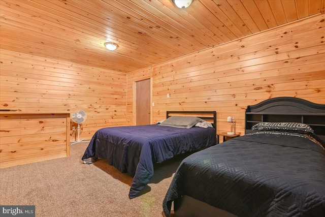 carpeted bedroom featuring wood walls and wood ceiling