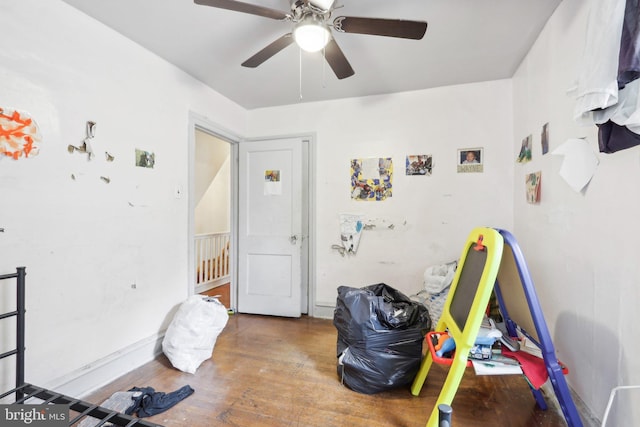 recreation room featuring ceiling fan and wood-type flooring