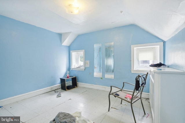 living area with lofted ceiling