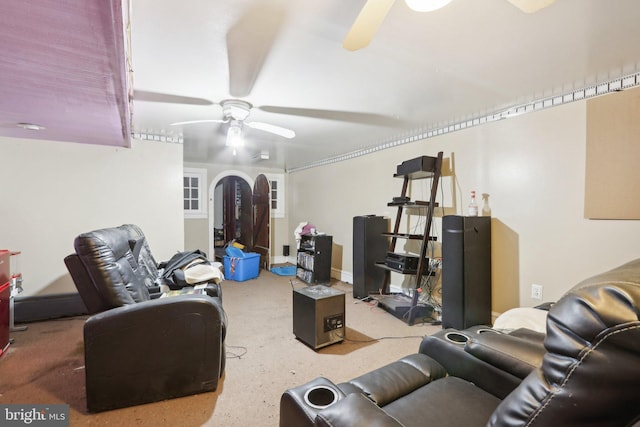 living room featuring ceiling fan