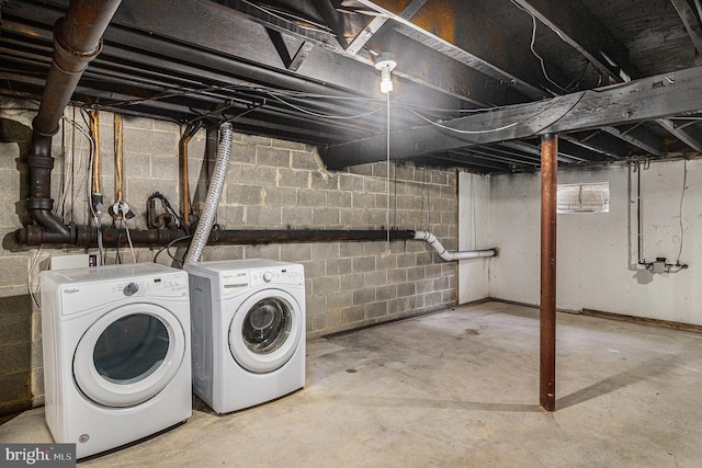 basement with separate washer and dryer