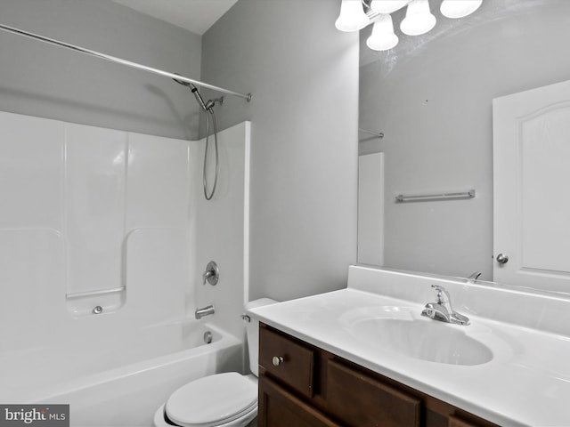 full bathroom with vanity, bathing tub / shower combination, and toilet