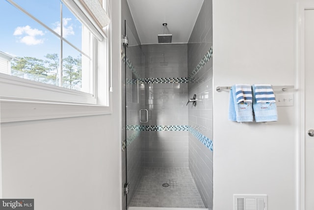 bathroom featuring walk in shower