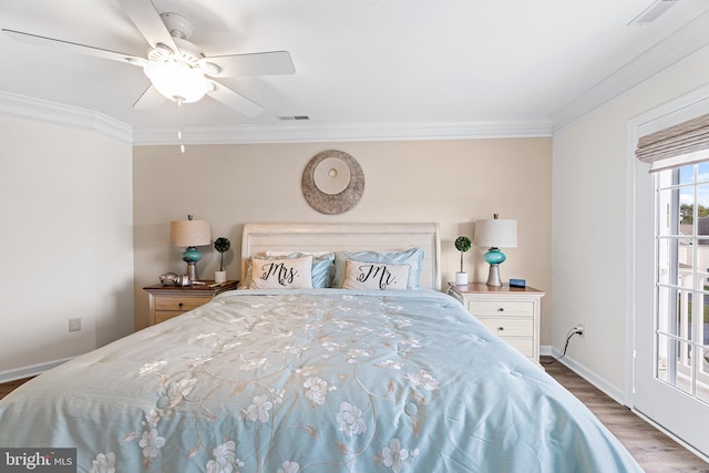 bedroom with ceiling fan, dark hardwood / wood-style flooring, and crown molding