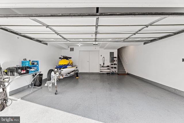 garage featuring a garage door opener