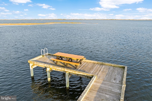 dock area featuring a water view