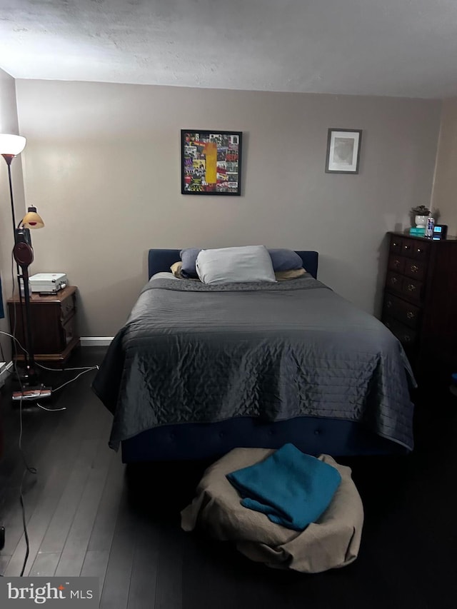 bedroom featuring hardwood / wood-style floors